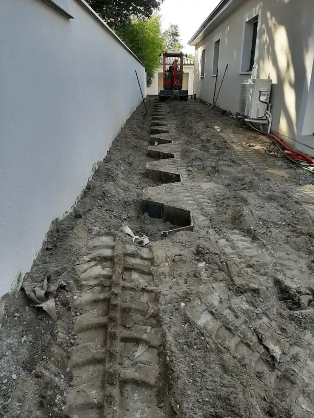 Installation d'un écran anti-racine